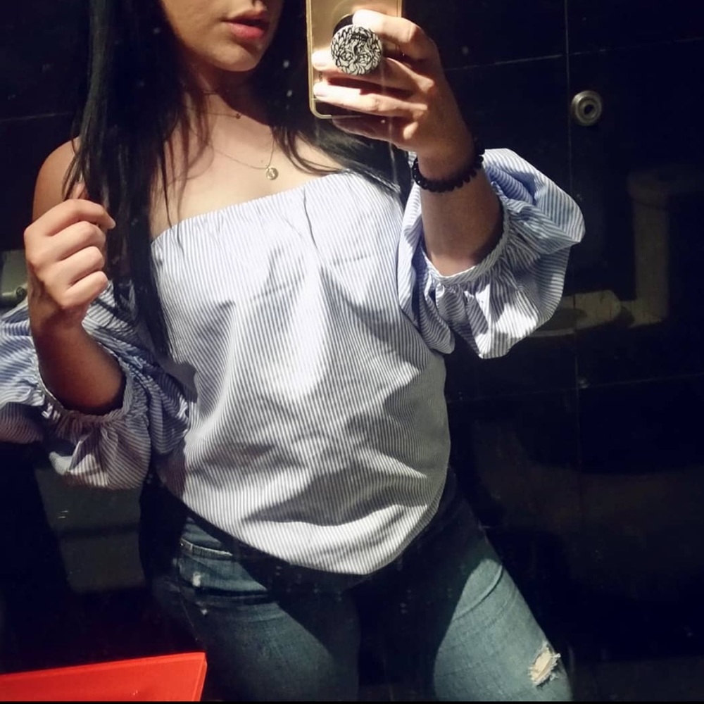 Blue and white striped blouse with puffed sleeves